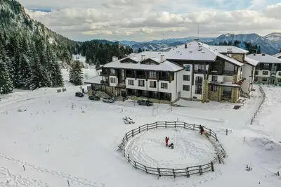 an aerial view of a ski lodge in the snow at 4 Seasons Apartment 535, Oak Residence in Smolyan
