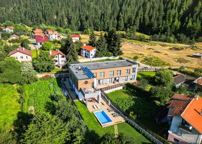 an aerial view of a house with a pool at Mountain View in Govedartsi