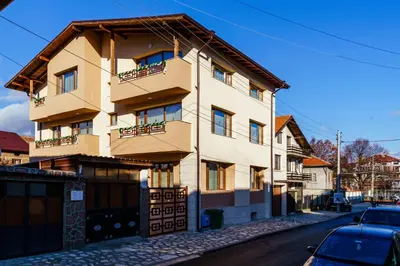 a building on the side of a street at Свети Никола in Razlog