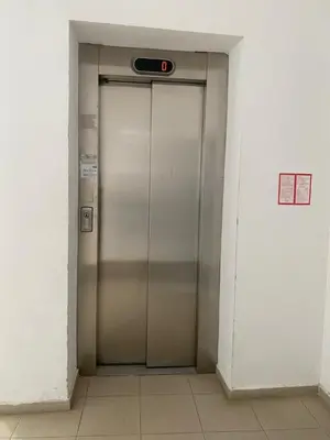 a large metal elevator door in a building at Lovely Аpartment in IGLIKA 2,Borovets in Borovets