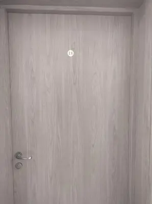 a wooden cabinet with a door in a room at St John Park Boutique room Gero in Bansko