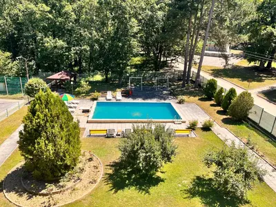 an overhead view of a swimming pool in a yard at Почивна база 