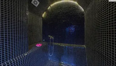 a bathroom with a black tiled room with a tub at Hotel FAMIL - adults only in Bansko