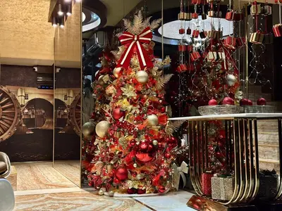 a christmas tree with ornaments in a store at HIDDEN BANK: Cash in Plovdiv