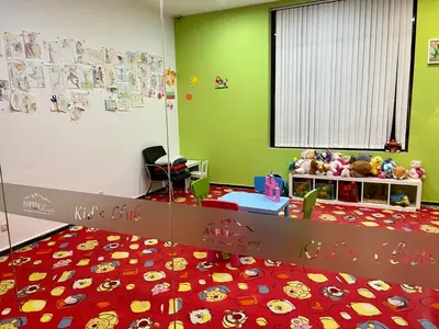 a childs room with green walls and a red carpet at Pirin Dream View Apartments in Razlog