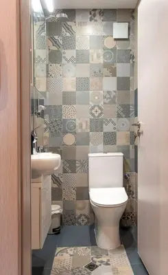 a bathroom with a toilet and a sink at Sunny & Stylish Brand new 2bdr Apartment + Parking in Sofia