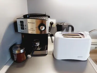 a coffee maker and a toaster on a counter at Studio Villa Park 410 in Borovets