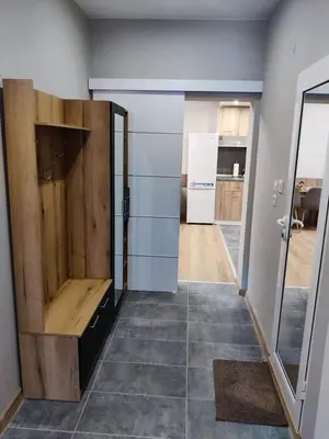 a room with a room with a door and a kitchen at Apartment Anelia 1 in Plovdiv