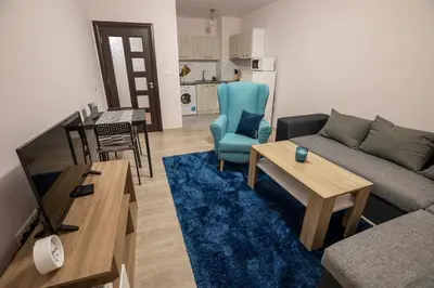 a living room with a couch and a table at Your place in Plovdiv