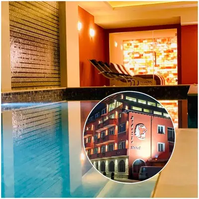 a reflection of a hotel on a table next to a pool at Ardo Spa Hotel and Restaurant in Sarnitsa