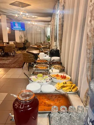 a buffet line with many different plates of food at Ardo Spa Hotel and Restaurant in Sarnitsa