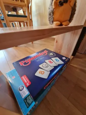 a box of disney monopoly sitting on a table at Riverpark Holiday Apartment, Sandanski in Sandanski
