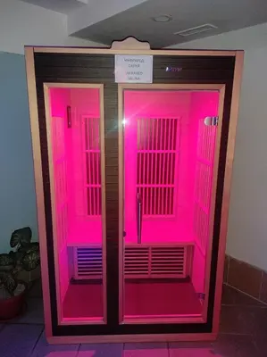 a room with pink lights on the inside of a building at Winslow Infinity Aparthotel in Bansko