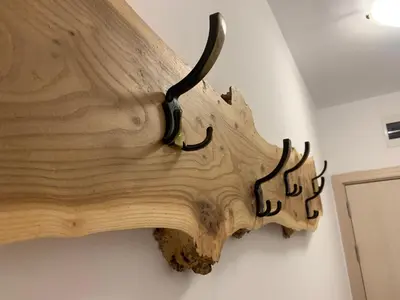 a wooden animal skull hanging on a wall at Bansko Ski To Door Studio De Luxe in Bansko