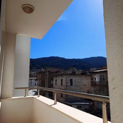 a view of a city from a balcony at Апартамент Лидия in Chepelare
