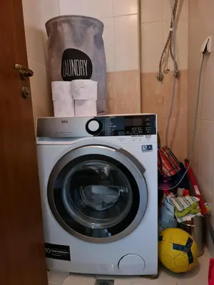 a washing machine in a bathroom with at Pirin Golf Apartment HOME with private garden in Bansko