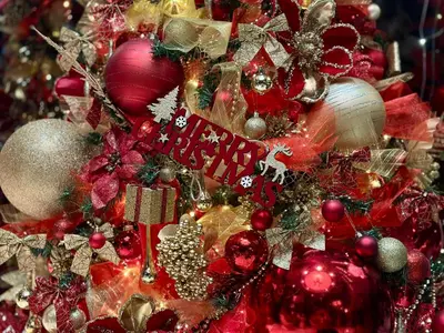 a close up of a christmas tree with ornaments at HIDDEN BANK: DIAMONDS in Plovdiv