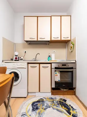 a kitchen with a sink and a dishwasher at Lovely 1BD Apartment close to the Summer Theatre by Flat Mаnager in Plovdiv