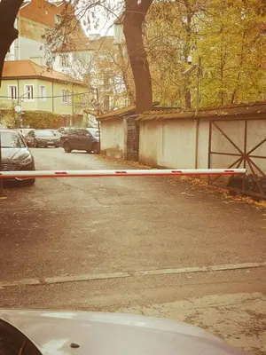 a car parked in a parking lot with a caution tape at The Best Place in the heart of Sofia City center in Sofia