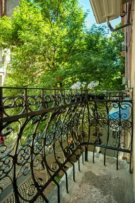 a wrought iron fence with a view of a river at Supreme Luxury Top Central 1 Bedroom Apartment in Sofia