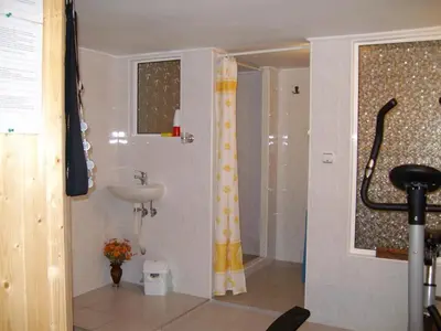 a bathroom with a sink and a shower at Къща Чолаков и син - стаи за гости in Devin