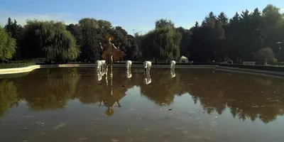 a person is standing in a pond of water at Луксозно студио One Place in Sofia A1 - Лозенец in Sofia