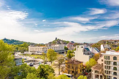 a cityscape of a city with buildings and trees at The Cozy Home 1-Bedroom in Central Plovdiv by Flat Mаnager in Plovdiv