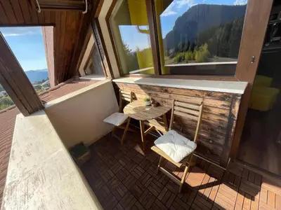 an overhead view of a balcony with a table and chairs at Boho Mountain Studio in Smolyan