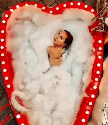 a picture of a woman in a cloud shaped heart at Панорама хаус Лещен и еко къщи Дървена и Землянка in Leshten