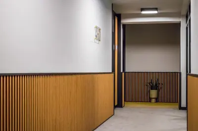 an office hallway with a door and a potted plant at EMAR HOTEL & SPA in Sapareva Banya