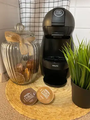 a coffee maker on a counter next to a coffee pot at Private Apartment Laplandia 77 (Pamporovo, Bulgaria) in Pamporovo
