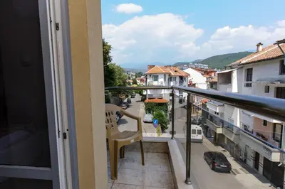 a balcony with a view of a street at Sandanski Peak Guest Rooms in Sandanski