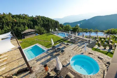 an aerial view of a villa with a swimming pool at Hotel Leshten in Leshten
