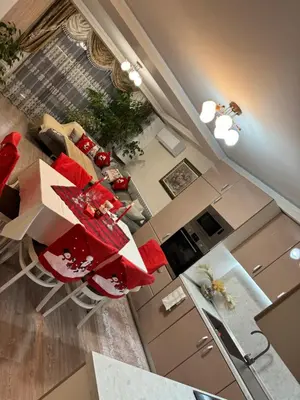 an overhead view of a kitchen with a christmas table at Guest House Tatiana /Къща за гости ТАТЯНА in Petrich