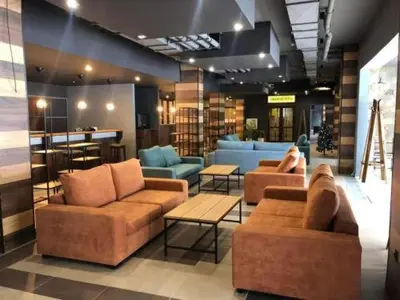 a lobby with two couches and chairs in a store at KLEPALSKI - Mountain Studio in Borovets