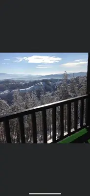 a balcony with a view of a city at Александрова вила 2 in Zlatograd