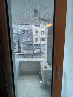 a view of a bathroom from a window with a building at Colonel apartment 938 in Sofia