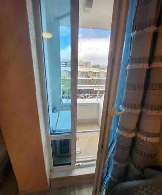 a window in a room with a view of a balcony at Colonel apartment 944 in Sofia