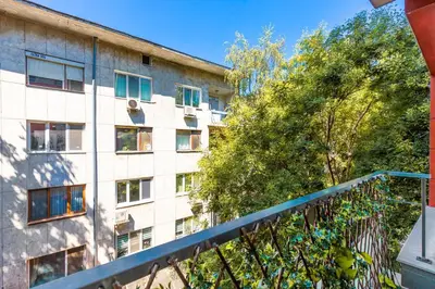 an apartment building with trees in front of it at Stylish 2BD Apartment with a Nice Cozy Terrace by Flat Mаnager in Plovdiv
