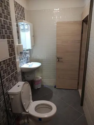 a bathroom with a toilet and a sink at Colonel apartment 957 in Sofia