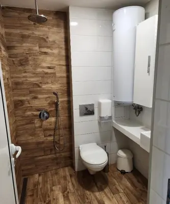 a bathroom with a toilet and a shower at Colonel apartment Relax in Sofia