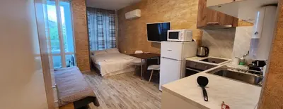 a small apartment with a kitchen and a living room at Colonel apartment 941 in Sofia