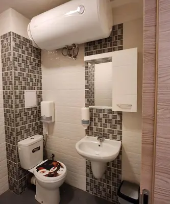 a bathroom with a toilet and a sink at Colonel apartment 963 in Sofia