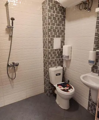a bathroom with a toilet and a sink at Colonel apartment 963 in Sofia