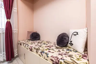 a bedroom with a bed with two stuffed animals on it at Bright Modern 2BD Apartment with Panoramic View by Flat Mаnager in Plovdiv