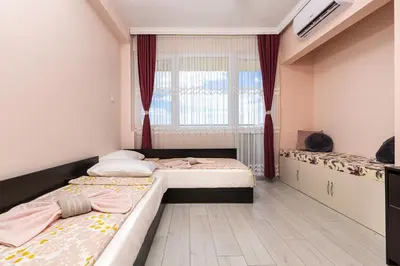 a bedroom with two beds and a window at Bright Modern 2BD Apartment with Panoramic View by Flat Mаnager in Plovdiv