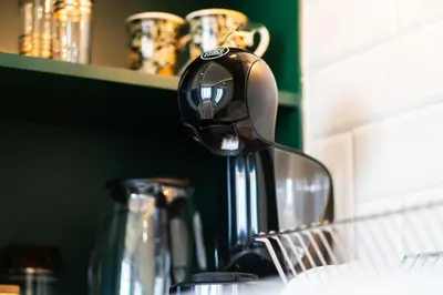 a tea kettle sitting on top of a kitchen counter at Heart of the City Center Lux Apartment2 with View in Sofia