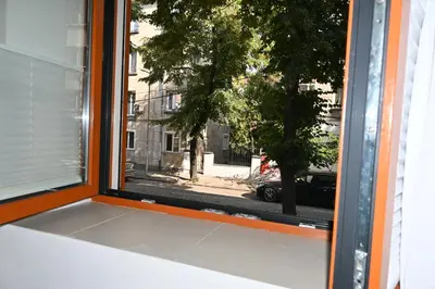 a window with a view of a street at Villa Magicland in Sofia