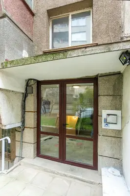 a sliding glass door on a building at Sofia Downtown Boutique Apartment in Sofia