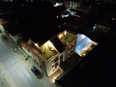 an overhead view of a building with a green yard at ENIS Hotel със закрит и отоплен минерален басейн in Sapareva Banya